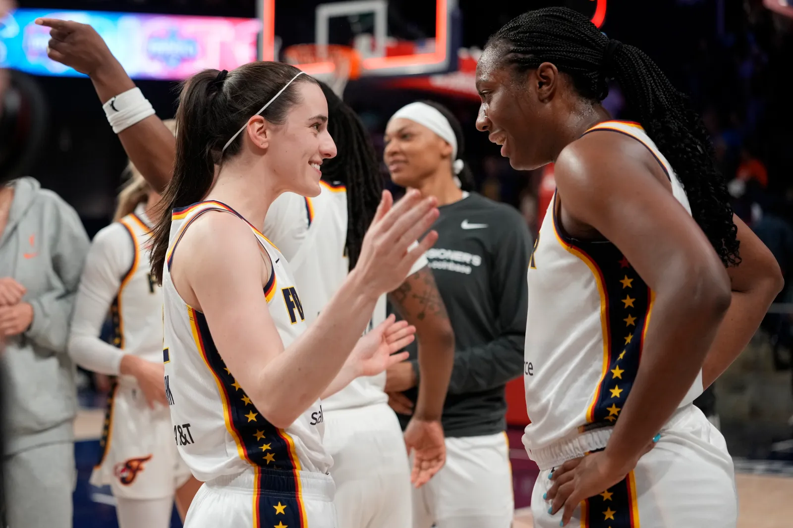 WASHINGTON, DC - JUNE 08: Caitlin Clark #22 of the Indiana Fever celebrates with Aliyah Boston #7 after scoring the game-winning three pointer during the second half against the Washington Mystics at CareFirst Arena on June 08, 2026 in Washington, DC. (Photo by Jess Rapfogel/Getty Images)