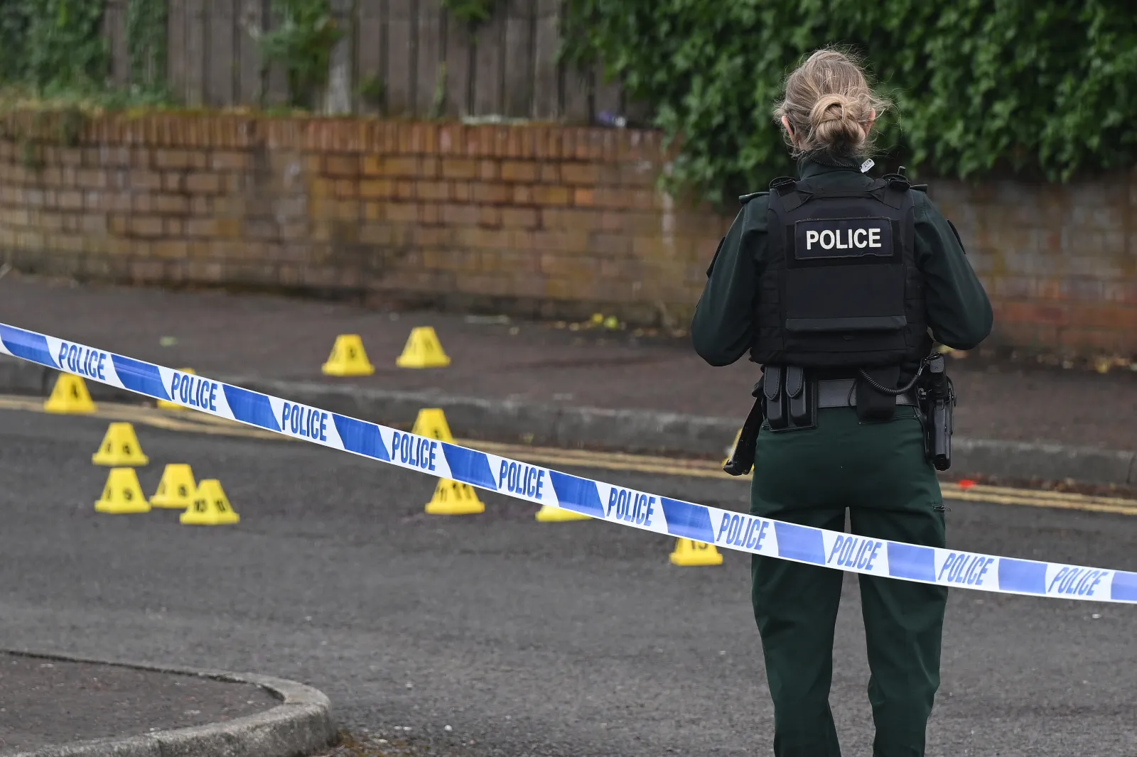 Police attend the scene following a stabbing attack in North Belfast on June 9, 2026 in Belfast, Northern Ireland.