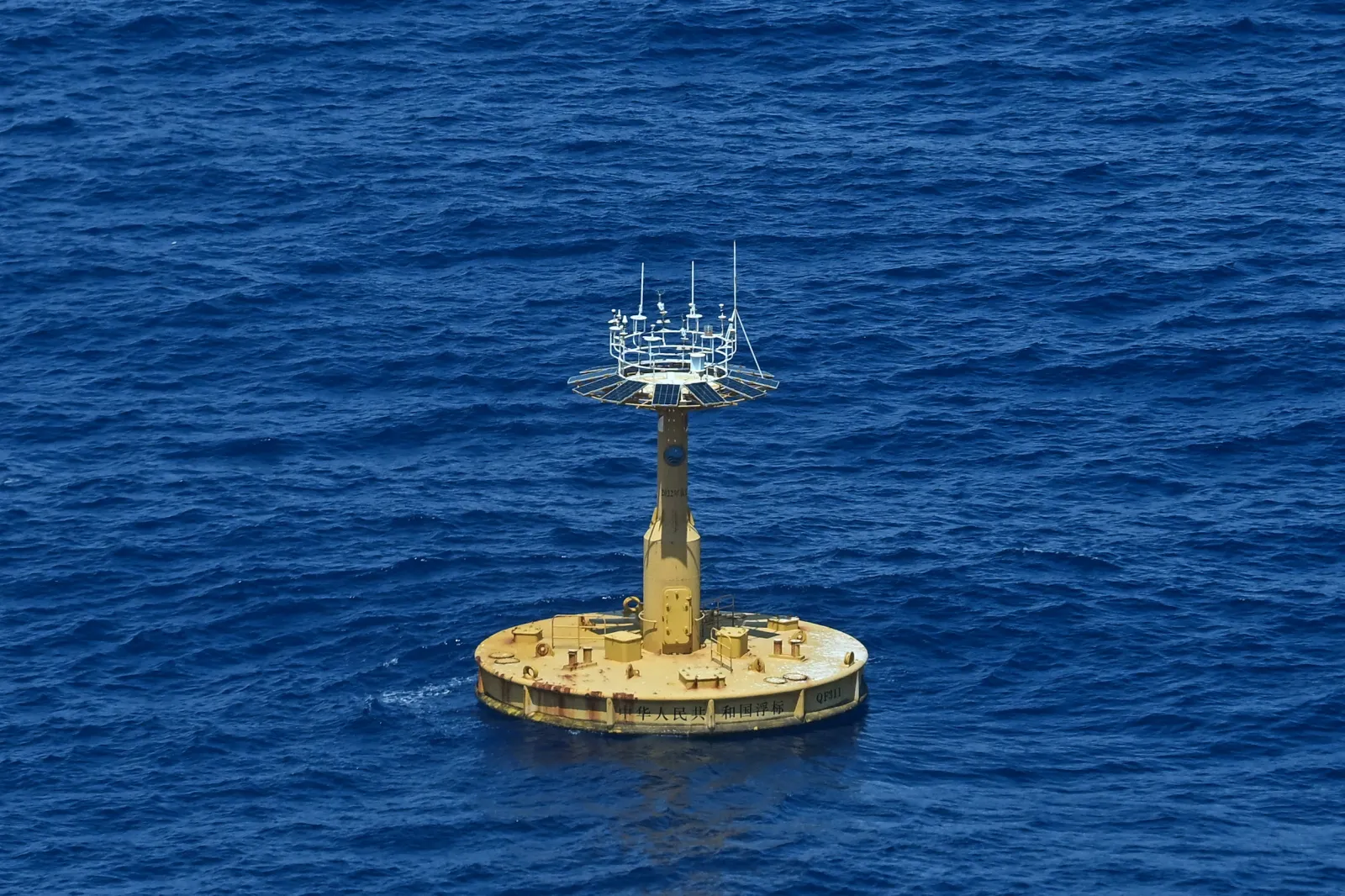 A buoy claimed by the Philippine Coast Guard to have been installed by a Chinese research vessel is seen at Scarborough Shoal in the disputed South China Sea on June 15, 2026.