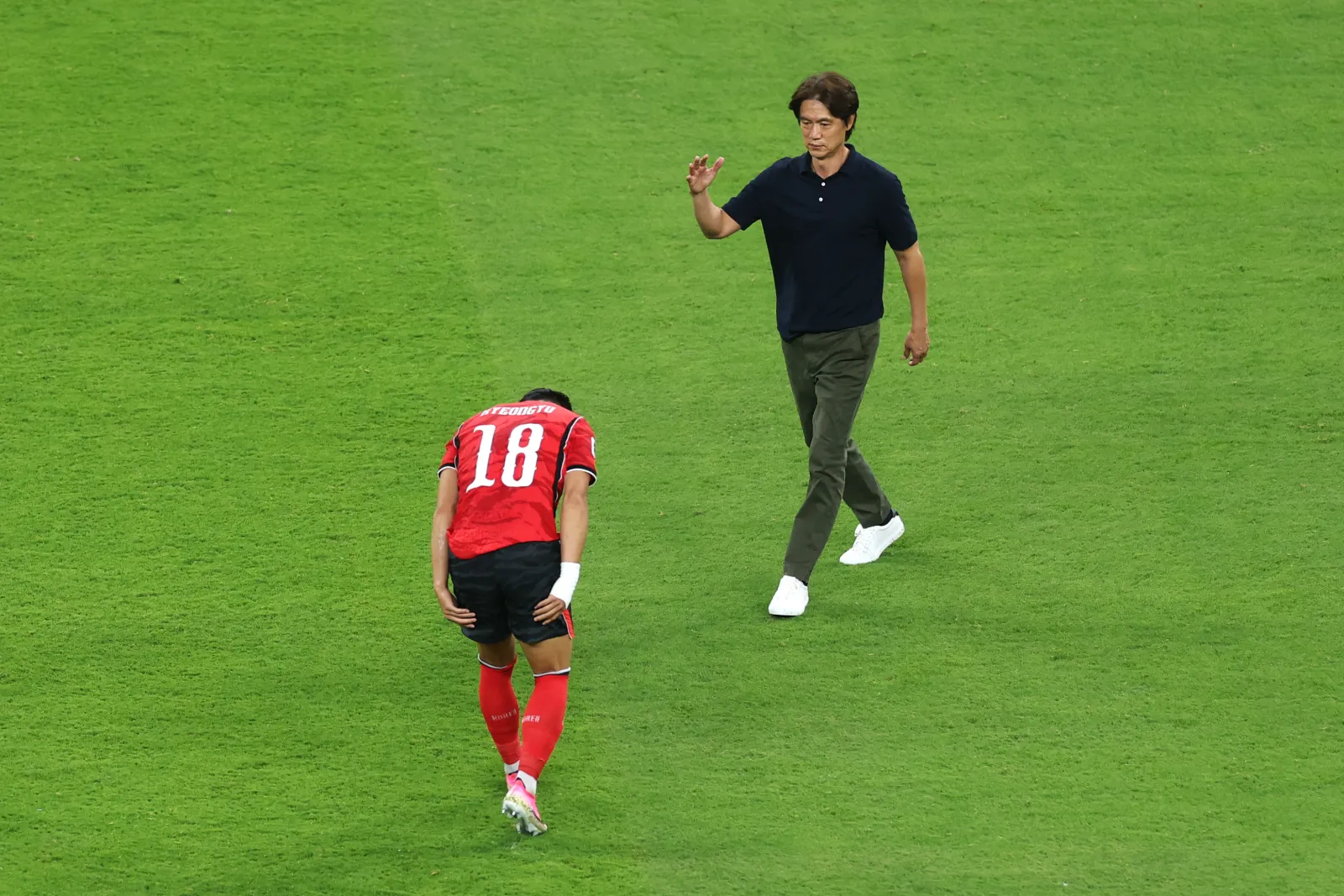 GUADALAJARA, MEXICO - JUNE 11: Myung-Bo Hong, Head Coach of Korea Republic, celebrates with Hyeon-Gyu Oh #18 of Korea Republic after the team's victory in the FIFA World Cup 2026 Group A match between Korea Republic and Czechia at Guadalajara Stadium on June 11, 2026 in Guadalajara, Mexico. (Photo by Lars Baron/Getty Images)