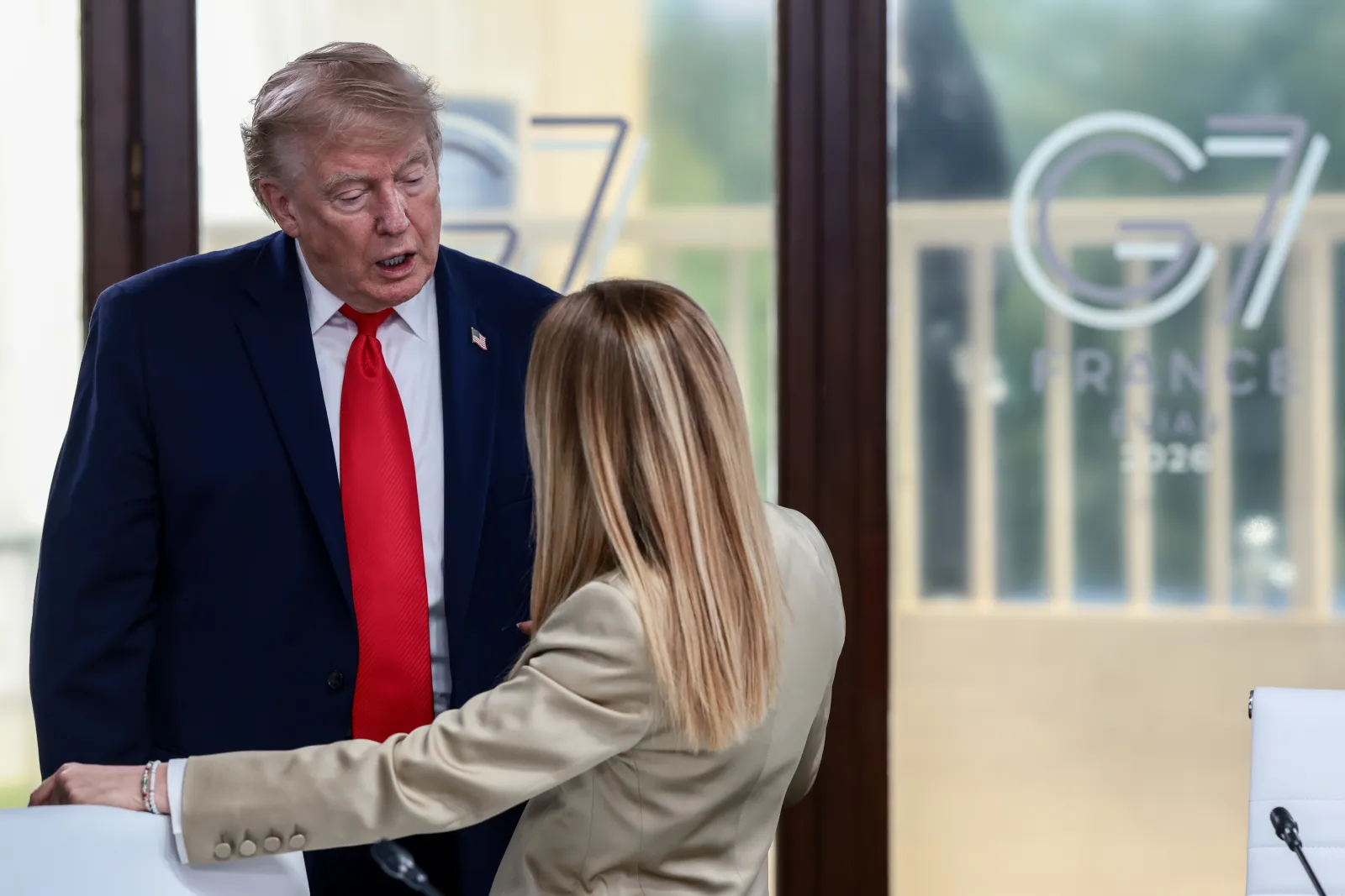 President Donald Trump speaks with Italian Prime Minister Giorgia Meloni at a working lunch with leaders of G7 and the Middle East, on June 16, 2026 in Evian-les-Bains, France.