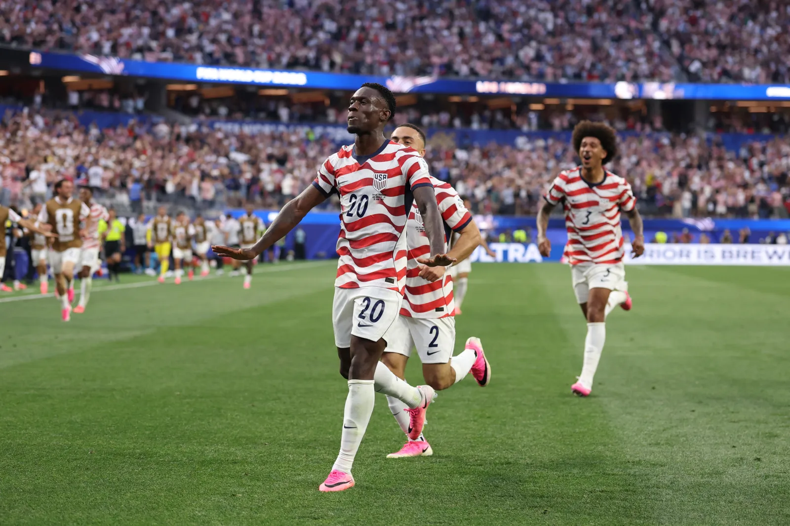 LOS ANGELES, CALIFORNIA - JUNE 12: Folarin Balogun #20 of the United States celebrates scoring his team's third goal during the FIFA World Cup 2026 Group D match between USA and Paraguay at Los Angeles Stadium on June 12, 2026 in Los Angeles, California. (Photo by Richard Heathcote/Getty Images)