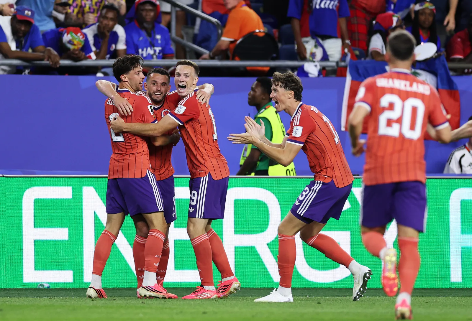 FOXBOROUGH, MASSACHUSETTS - JUNE 13: John McGinn (2nd L) #7 of Scotland celebrates with teammates after scoring his team's first goal during the FIFA World Cup 2026 Group C match between Haiti and Scotland at Boston Stadium on June 13, 2026 in Foxborough, Massachusetts. (Photo by Justin Setterfield/Getty Images)