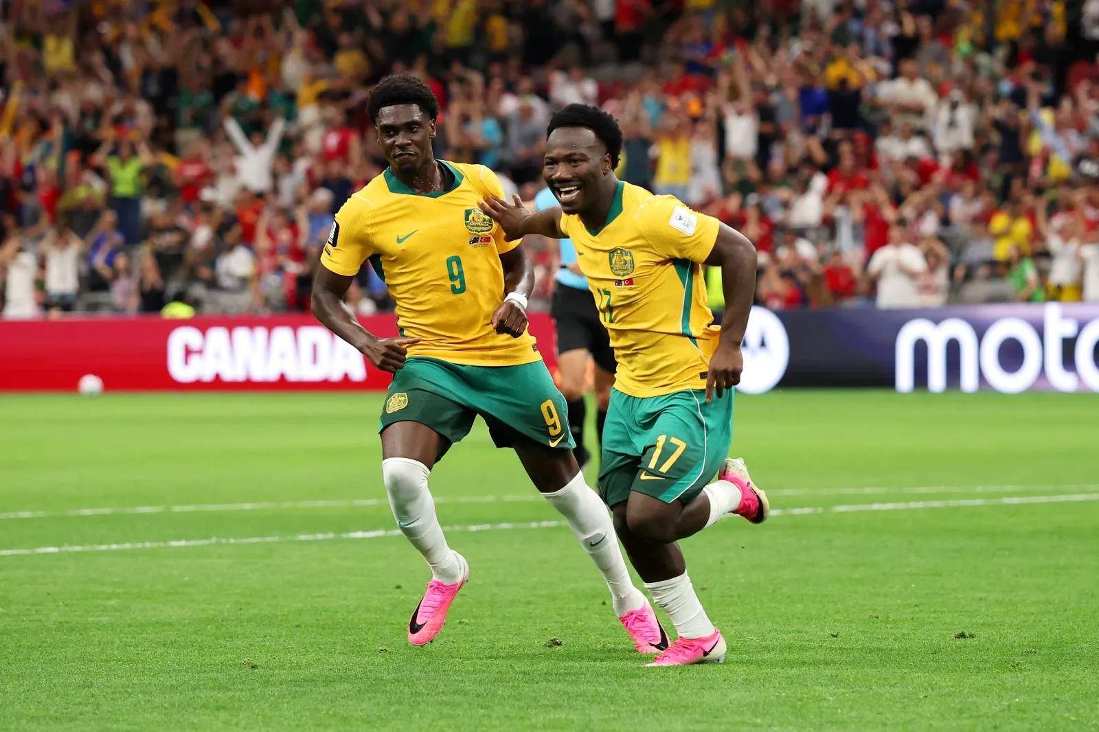  Nestory Irankunda #17 of Australia celebrates scoring his team's first goal with teammate Mohamed Toure #9 during the FIFA World Cup 2026 Group D match between Australia and Türkiye at BC Place Vancouver on June 13, 2026 in Vancouver, British Columbia. (Photo by Stu Forster/Getty Images)