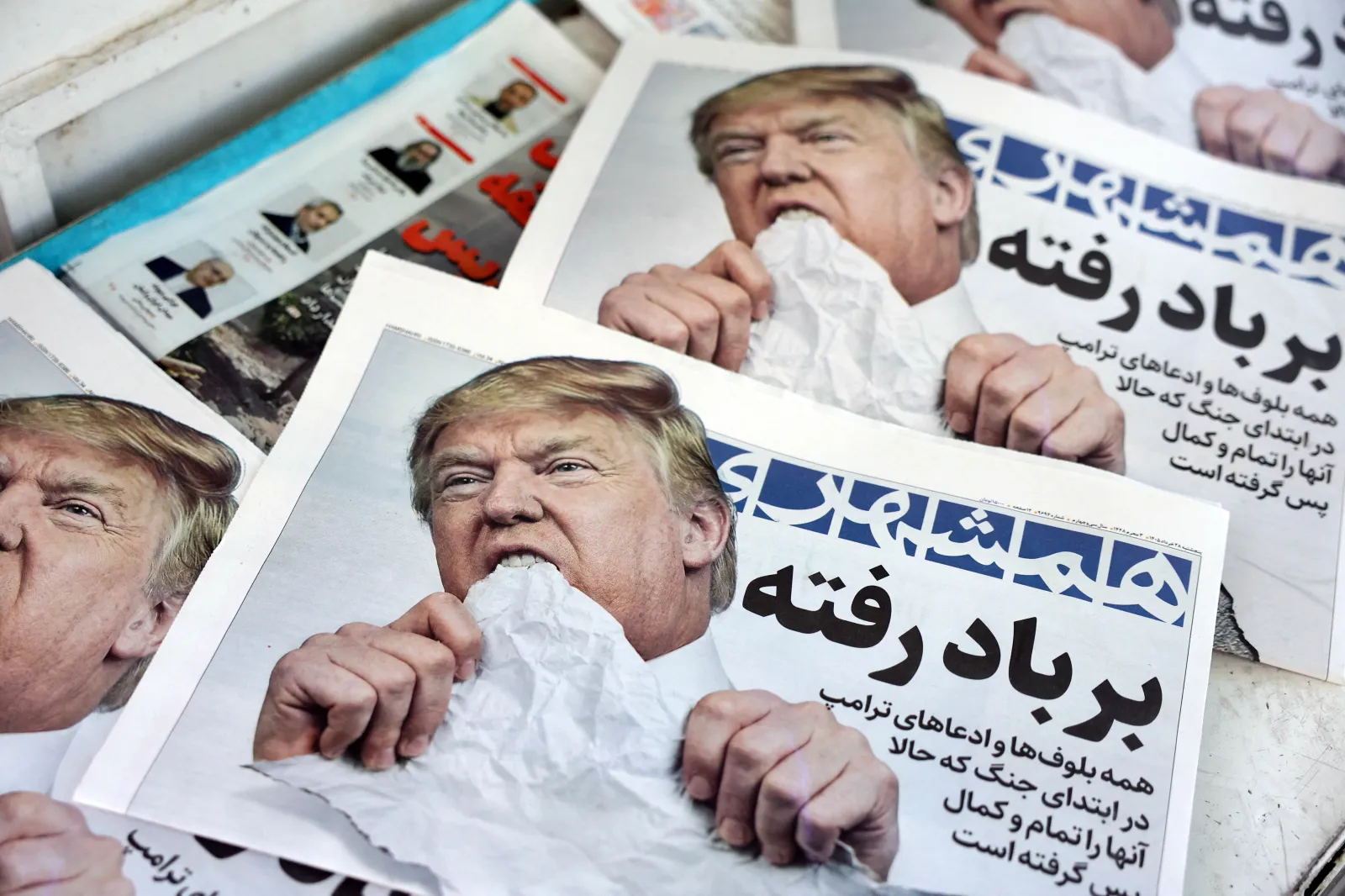 Iranian daily newspaper Hamshahri, bearing an image of U.S. President Donald and a headline that reads "Gone with the wind" in Tehran on June 18, 2026 - a day after Trump signed the deal. (Photo by AFP via Getty Images) /
