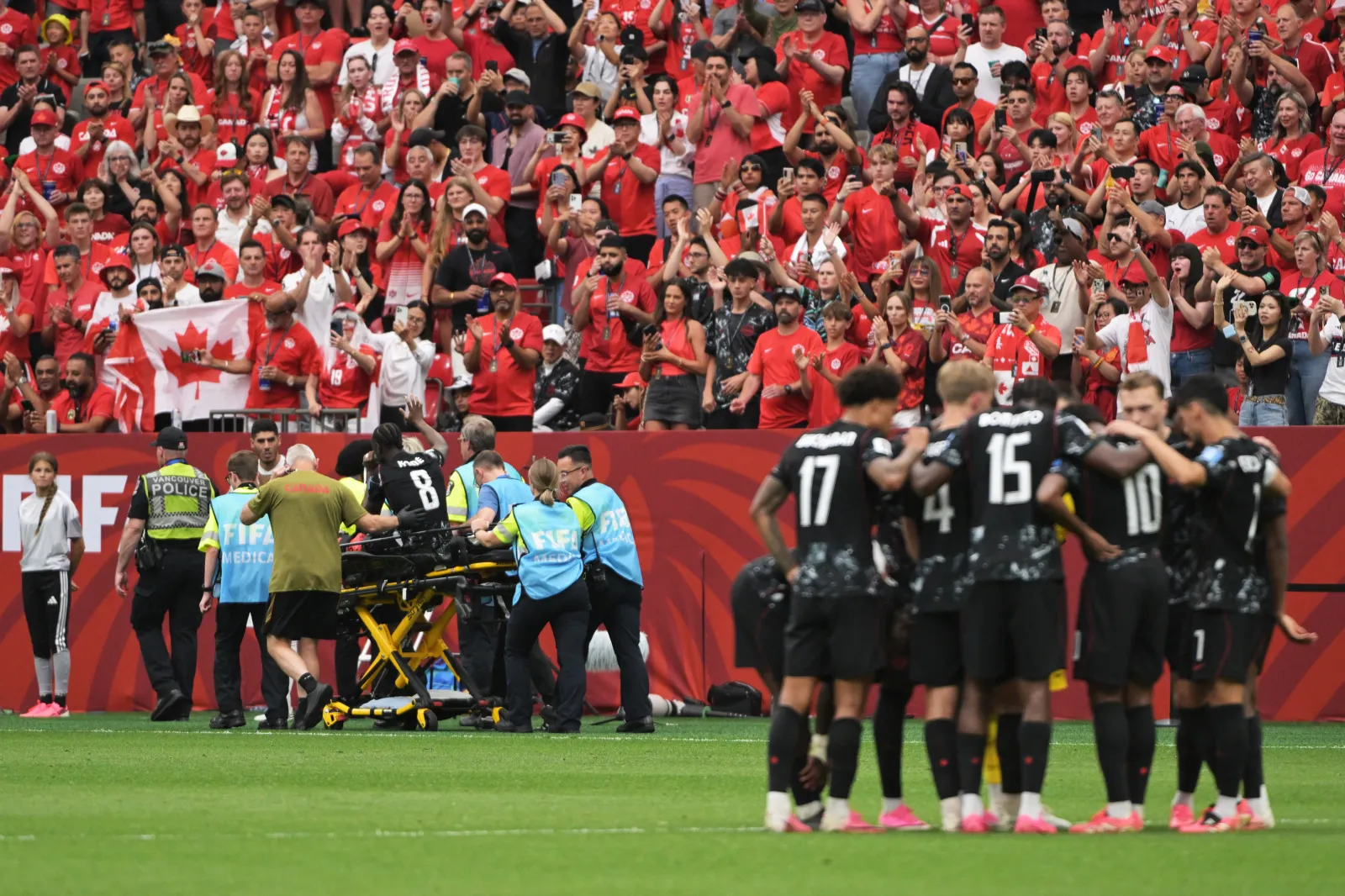 VANCOUVER, CANADA - JUNE 18: Ismael Kone of Canada leaves the pitch following a serious injury during the World Cup match between Canada v Qatar at the Vancouver Stadium on June 18, 2026 in Vancouver Canada (Photo by Dale MacMillan/Soccrates/Getty Images)