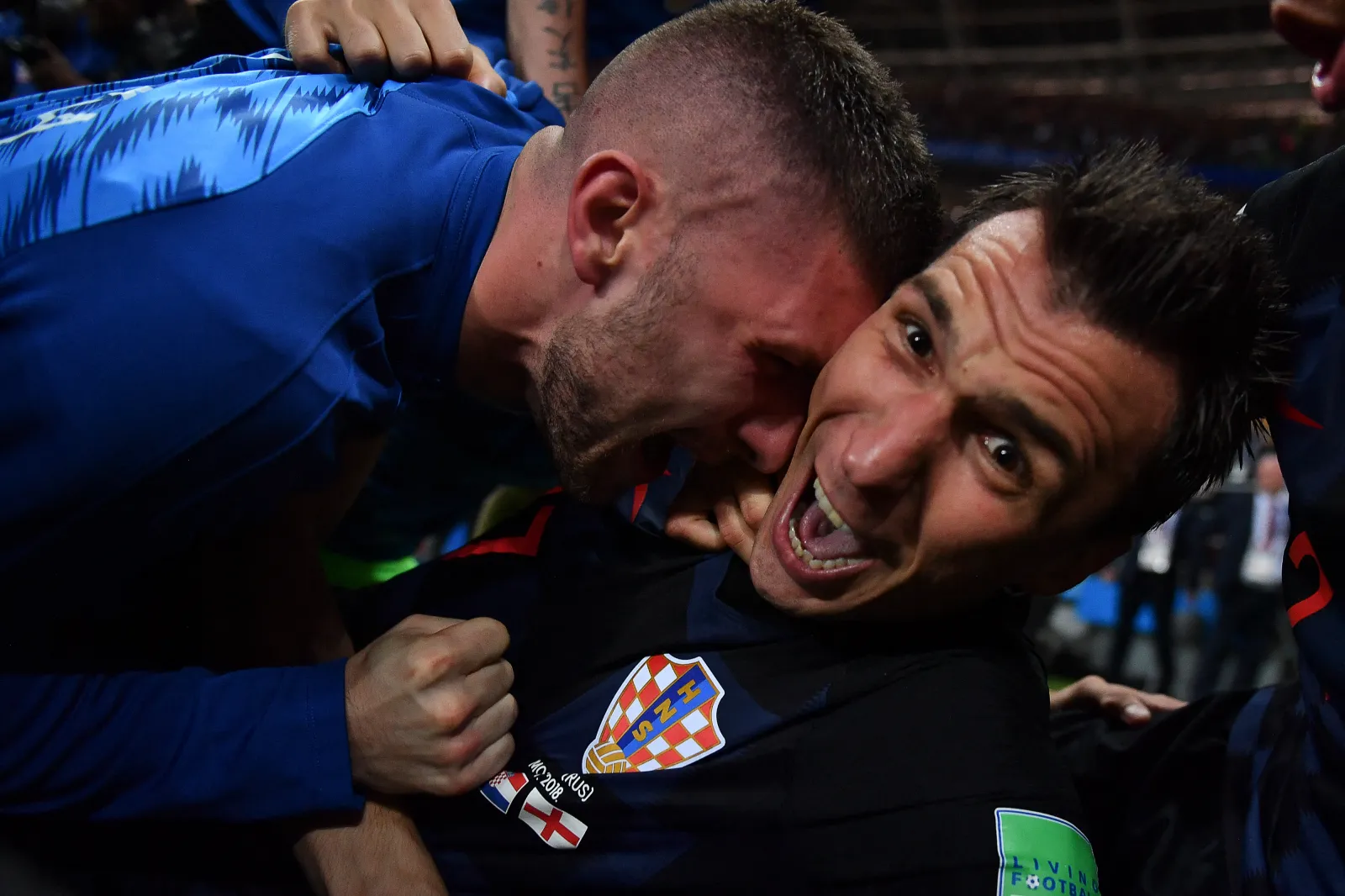 Croatia's forward Mario Mandzukic (R) celebrates with teammates after scoring his team's second goal during the Russia 2018 World Cup semi-final football match between Croatia and England at the Luzhniki Stadium in Moscow on July 11, 2018. (Photo by Yuri CORTEZ / AFP via Getty Images)