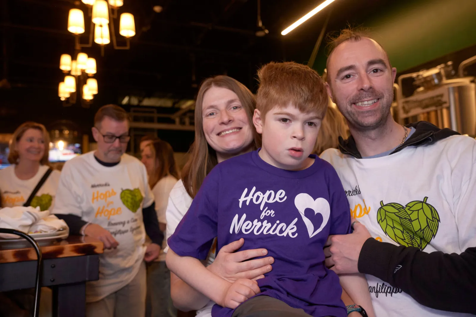 Parents Nancy and Matt Rubino pictured with Merrick.