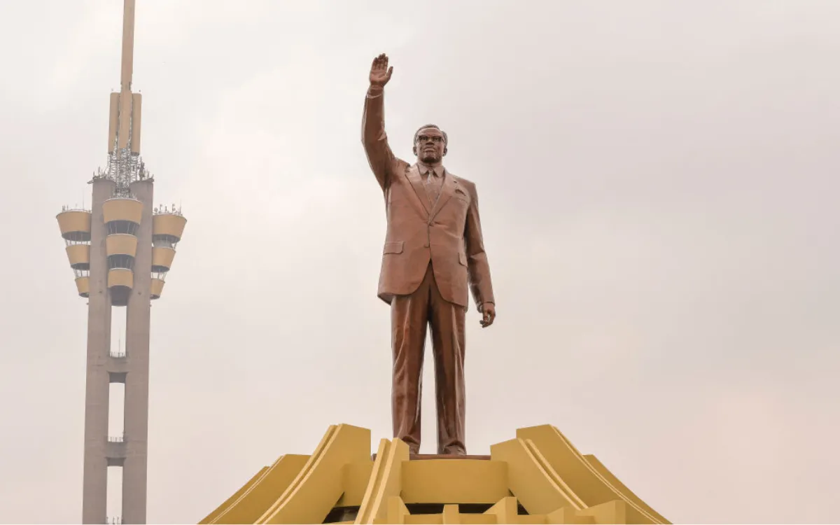 A general view of the Slain Congolese independence hero Patrice Lumumba's mausoleum at the Limete Tower in Kinshasa on June 30, 2022. - The coffin of Patrice Lumumba was buried in Kinshasa on June 30, 2022, the anniversary of the independence of the Democratic Republic of Congo, more than 61 years after his assassination and at the end of a nine-day pilgrimage which retraced the highlights of his life. The coffin was brought to a concrete and glass mausoleum, surmounted by a statue of Lumumba, erected on the avenue that bears his name and leads to Kinshasa's international airport, at the Limete Tower.