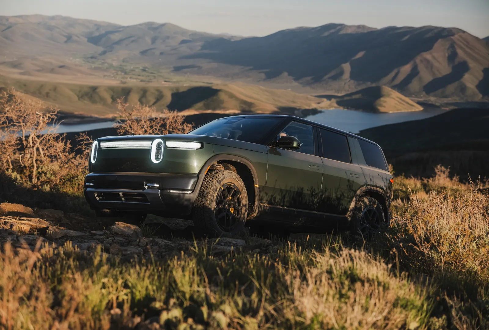 Rivian-R2-Off-Roading-Mountains.png?w=1600&quality=80&webp=1