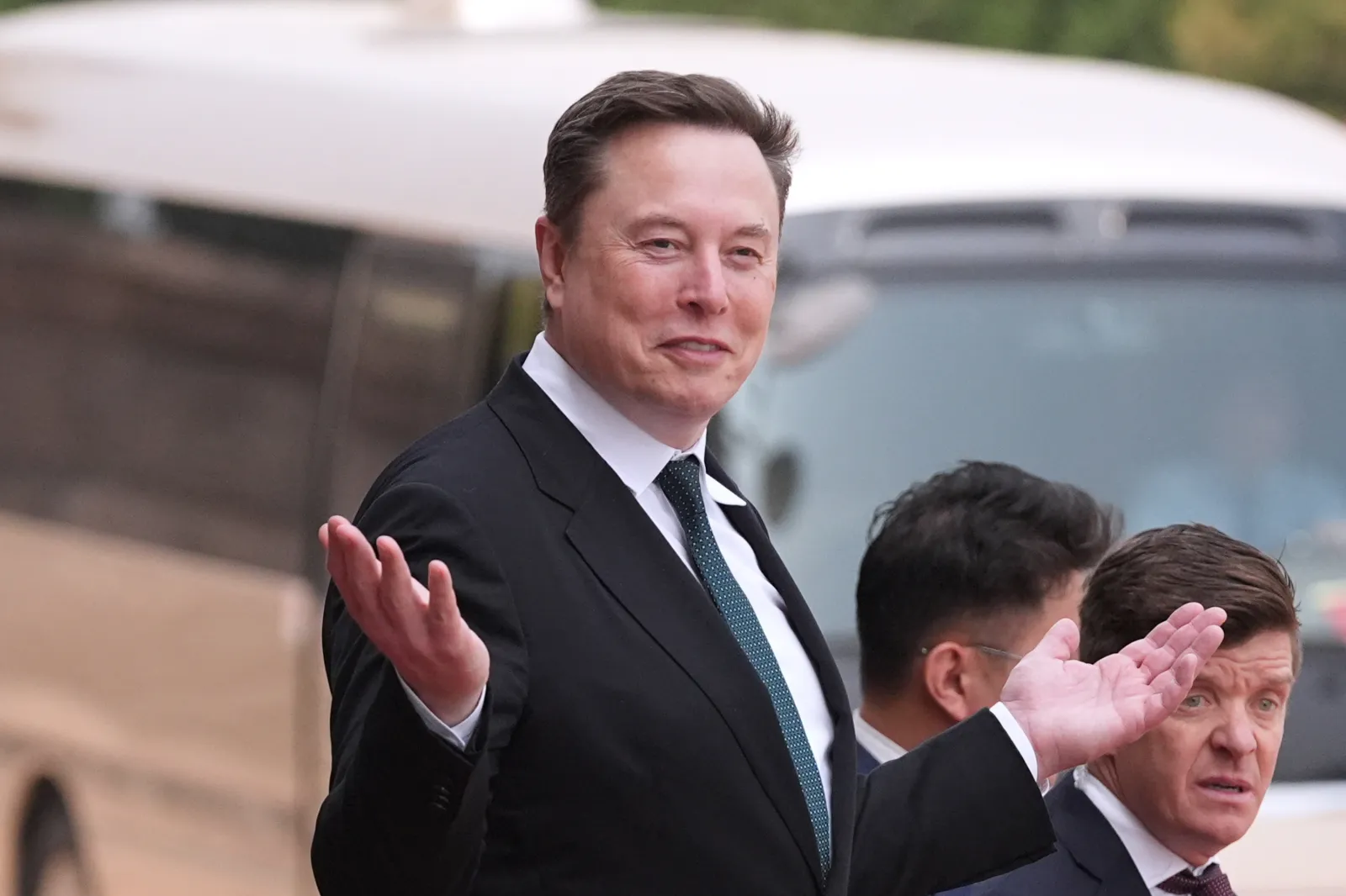 Elon Musk departs after a welcome ceremony with President Donald Trump and China's President Xi Jinping at the Great Hall of the People, Thursday, May 14, 2026, in Beijing.