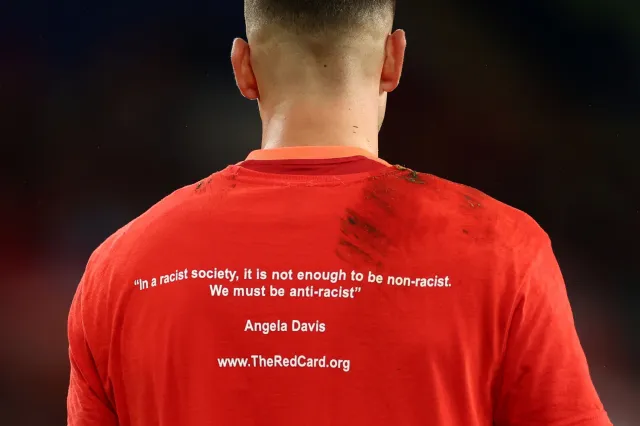 Karl Darlow of Wales wears an anti-racism T-shirt at a FIFA World Cup 2026 qualifier match, October 13, 2025, Cardiff City Stadium, Wales.