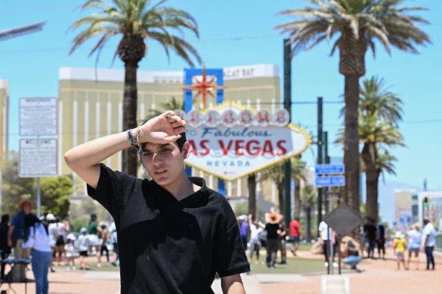 A man walks near the Las Vegas strip during a heatwave on July 7, 2024.