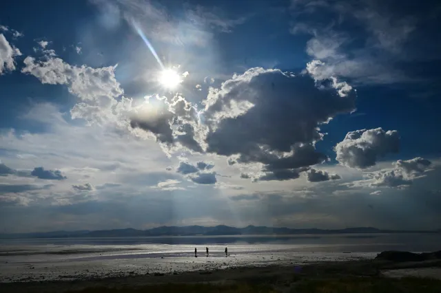People visit the Great Salt Lake in Salt Lake City, Utah, on September 9, 2024.