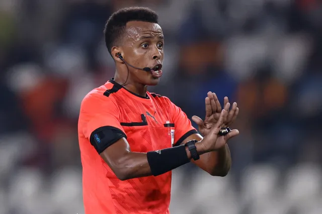 Somalian referee Omar Abdulkadir Artan gestures during the Africa Cup of Nations (CAN) 2024 group D football match between Mauritania and Algeria at Stade de la Paix in Bouake on January 23, 2024.