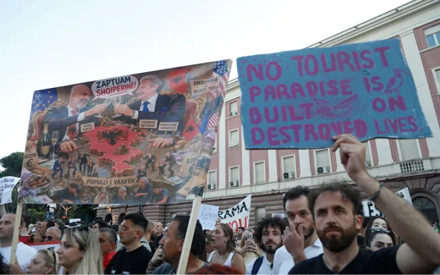 Protestors take part in a demonstration in front of the prime minister's office, against the construction of a luxury resort near a protected natural area, in Tirana on June 2, 2026. Several thousand citizens demonstrated in Tirana for the second consecutive night to demand transparency around a tourist complex project allegedly linked to US President Donald Trump's son-in-law, Jared Kushner.