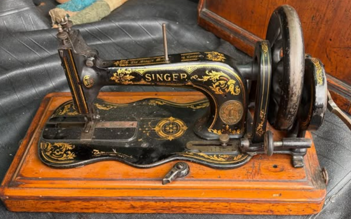 Man Dismantles Vintage Sewing Machine, Discovers L
