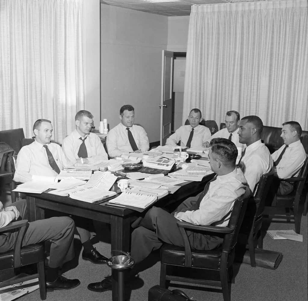 A group of Air Force fighter-interceptor pilots who fly the F-106 Delta Dart on missions checking out unidentified aircraft and unidentified flying objects is shown in a conference room at North American Defense Command headquarters in Colorado Springs, Colorado, Oct. 12, 1961. (AP Photo//Jack Urwilier)