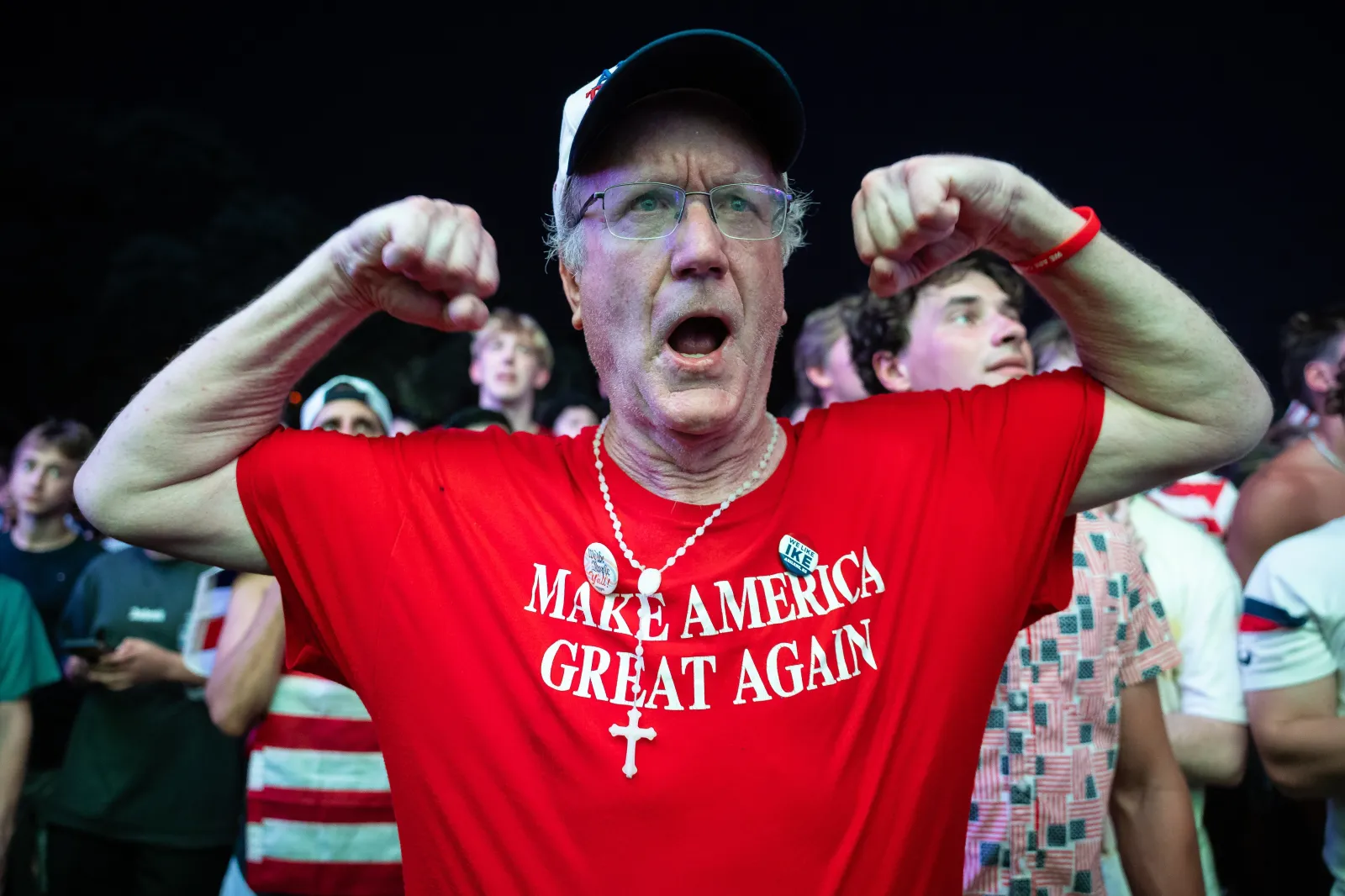 A man wearing a "MAKE AMERICA GREAT AGAIN" (MAGA) shirt reacts as he watches the United States vs. Bosnia and Herzegovina World Cup match in the FIFA Fan Zone on the National Mall in Washington, D.C. on July 1, 2026.