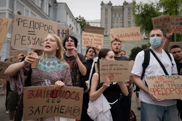 Activists shout slogans during a rally to denounce President Volodymyr Zelensky's decision to dismiss Defense Minister Mykhailo Fedorov after six months in the post, Kyiv, Ukraine, Sunday, July 19, 2026.