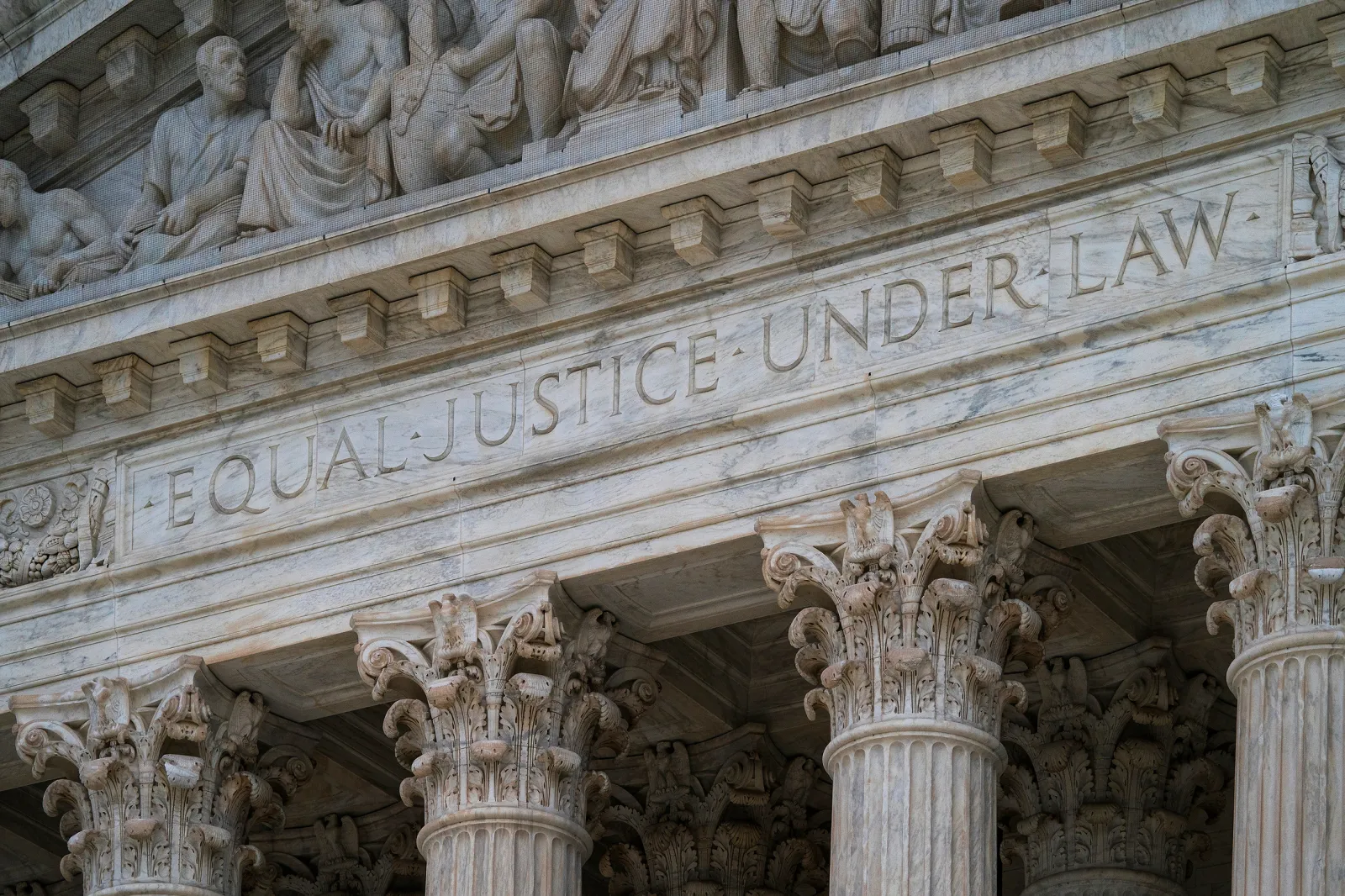 The facade of the Supreme Court building bearing the motto "Equal Justice Under Law," photographed on March 20, 2019.