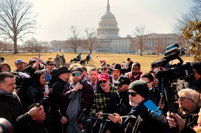 Members of the far-right group the Proud Boys, including their former leader Enrique Tarrio, Stewart Rhodes, Joe Biggs, Ethan Nordean and Zach Rehl speak to journalists on the east side of the U.S. Capitol on February 21, 2025 in Washington, DC.