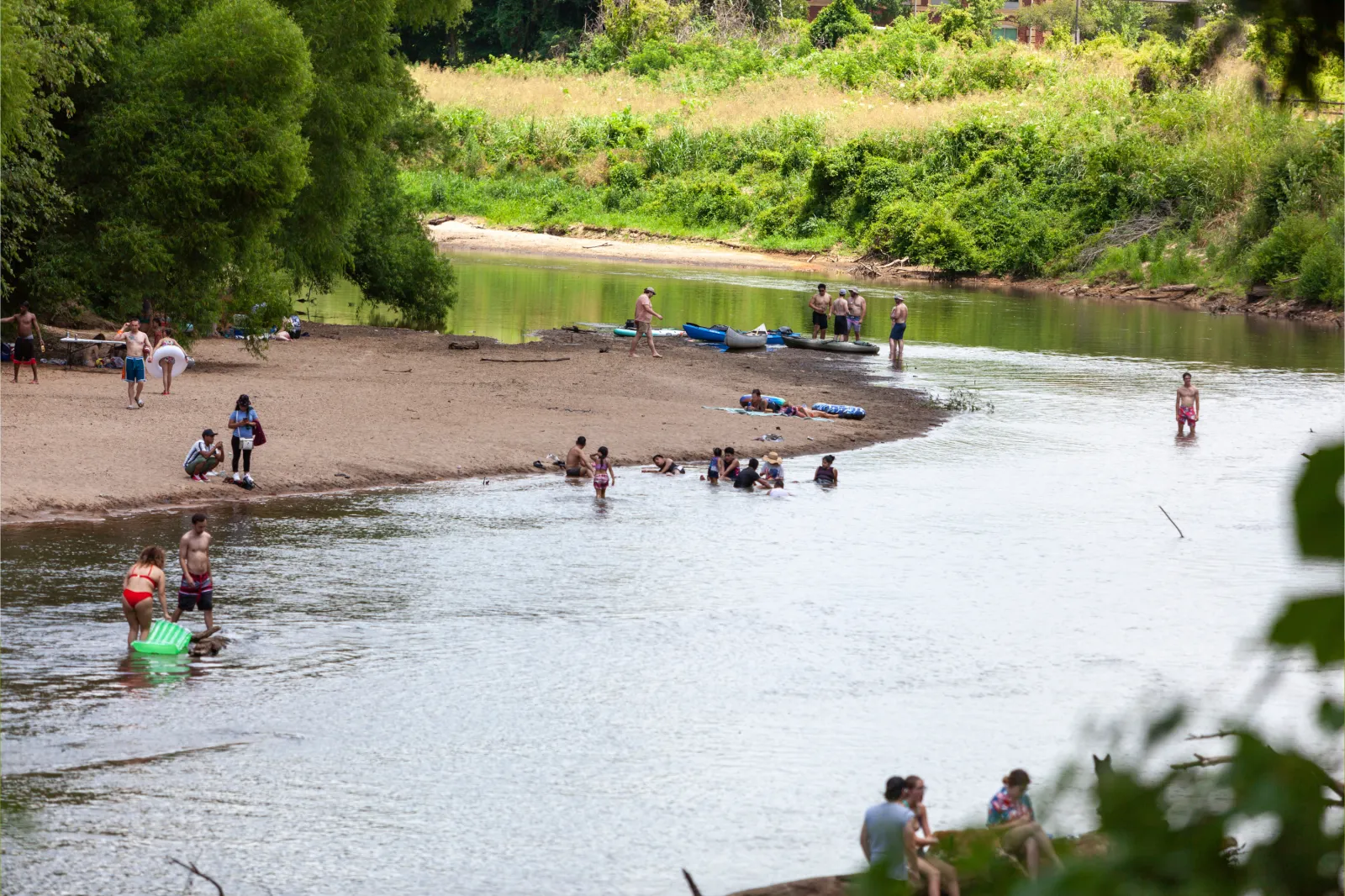 File image: People swim in the Wolf River in Memphis, Tennessee, on July 4, 2022.