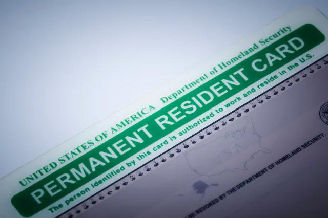 An editorial stock photo of a Permeant Resident Card also known as Green Card.