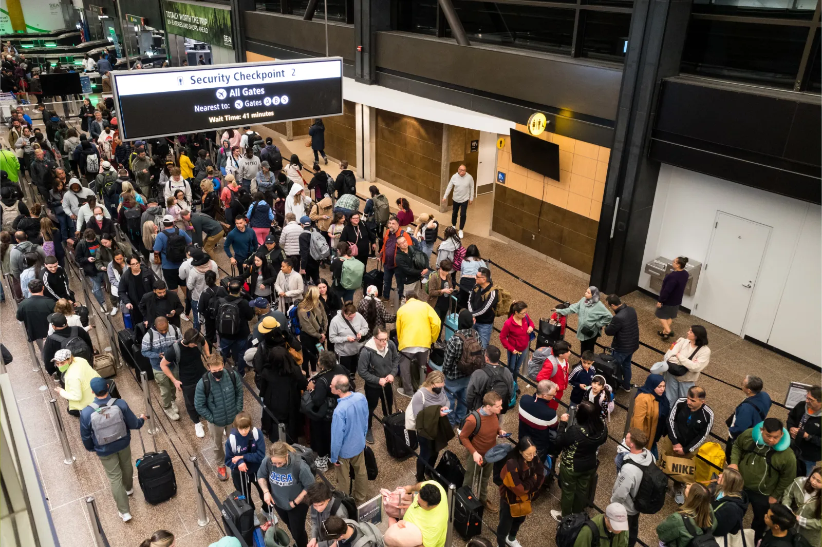 A crowded long line at a SeaTac airport security checkpoint in 2023 in Seattle.