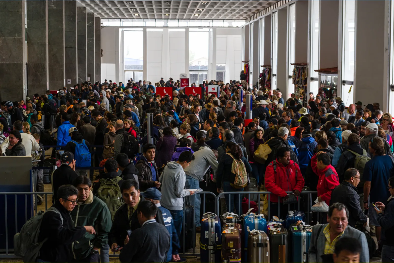File image: Crowds of people waiting to check in at an airport.