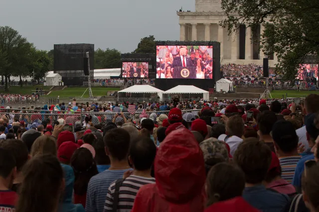 U.S. President Donald Trump is shown on a screen as he speaks during the "Salute to America" Fourth of July event at the Lincoln Memorial in Washington, DC, July 4, 2019.