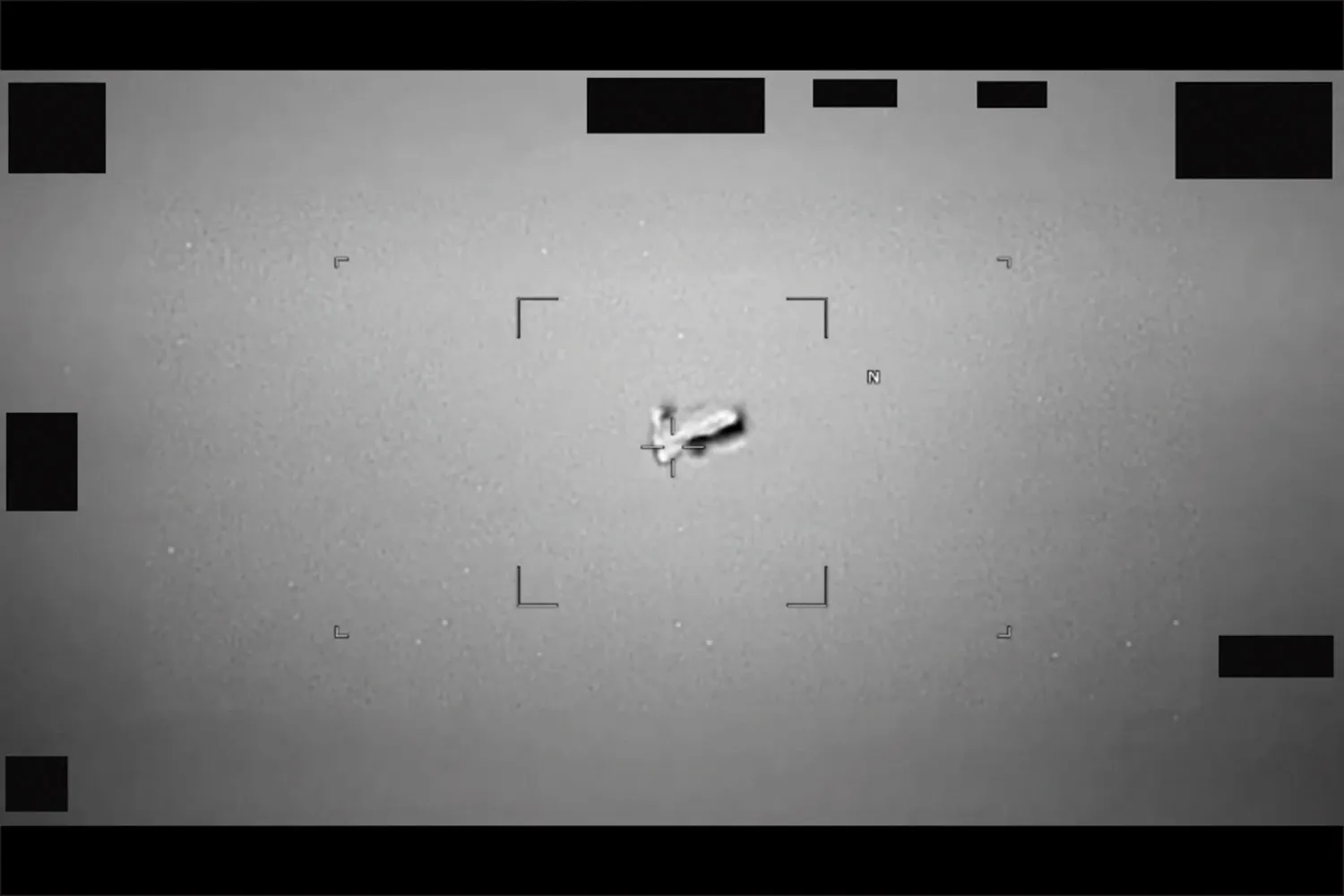 In this handout image provided by the Department of War, an image of a UAP that resembles a football-shaped body was reported in 2024 near Japan by the U.S. Indo-Pacific Command. The image was included with the initial release of UAP files on May 8, 2026.