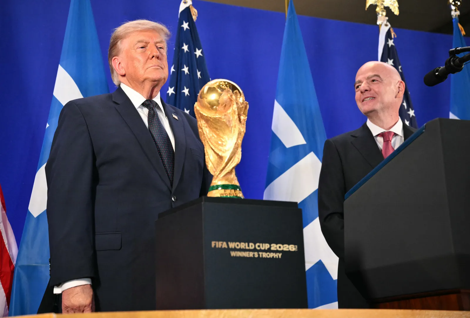 President Donald Trump and FIFA President Gianni Infantino attend a FIFA reception at Trump Tower in New York on July 17. President Trump will attend the 2026 World Cup Final between Spain and Argentina on Sunday. (Photo by Mandel NGAN / AFP via Getty Images)