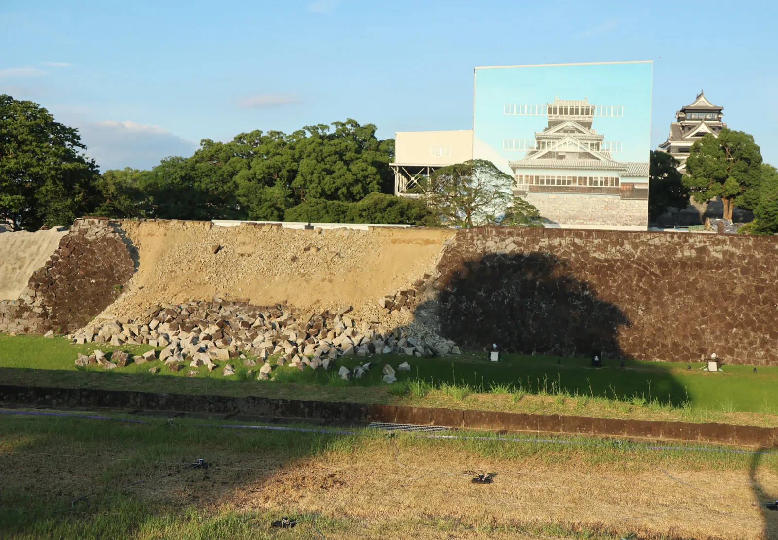 The collapsed stone walls of Kumamoto Castle are seen after an earthquake, in Kumamoto City on July 28, 2026. (Photo by JIJI Press / AFP via Getty Images) / Japan OUT