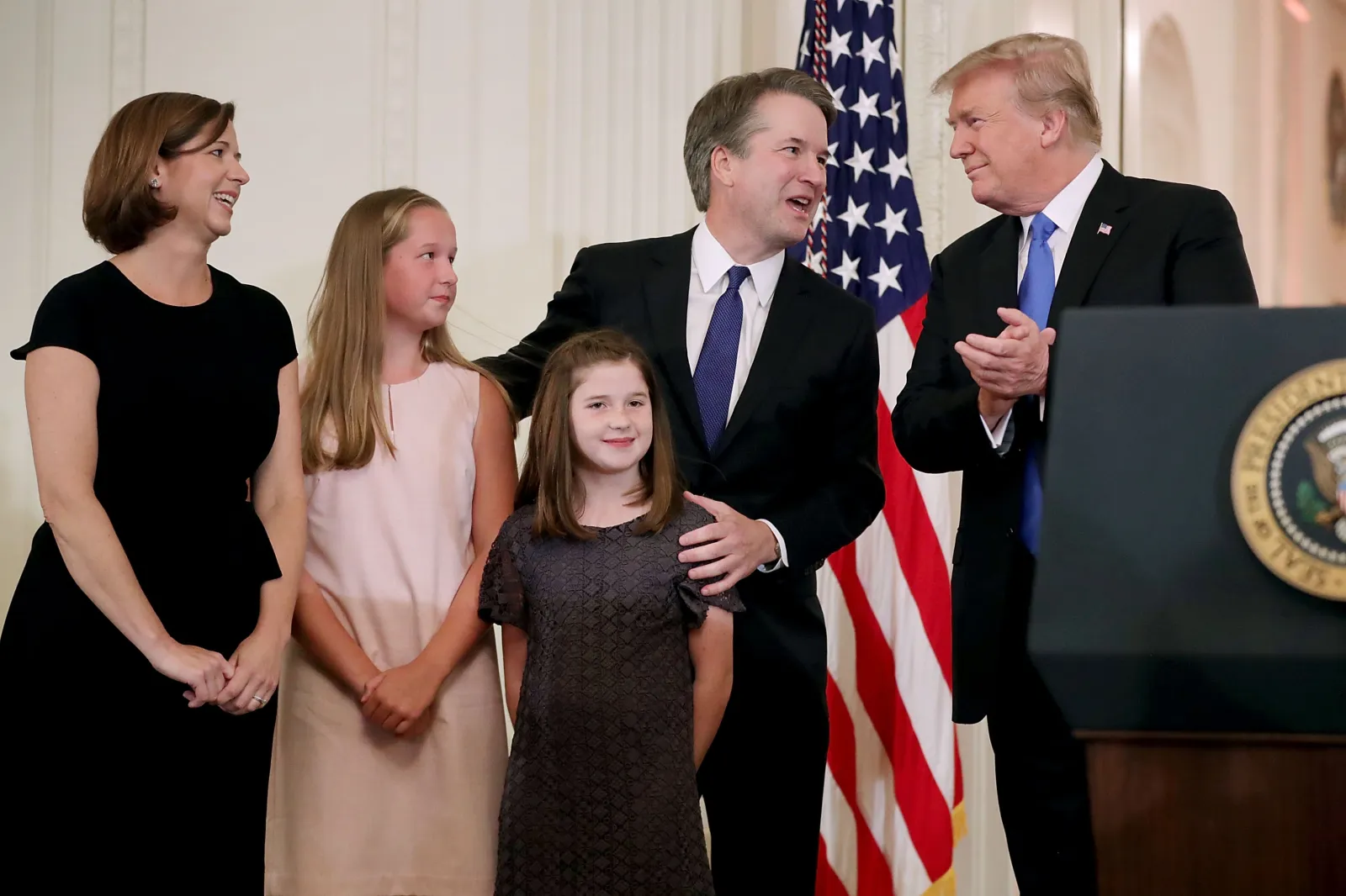 U.S. President Donald Trump (R), Judge Brett M. Kavanaugh (2nd R), his wife Ashley Estes Kavanaugh and their daughters, Margaret and Liza.