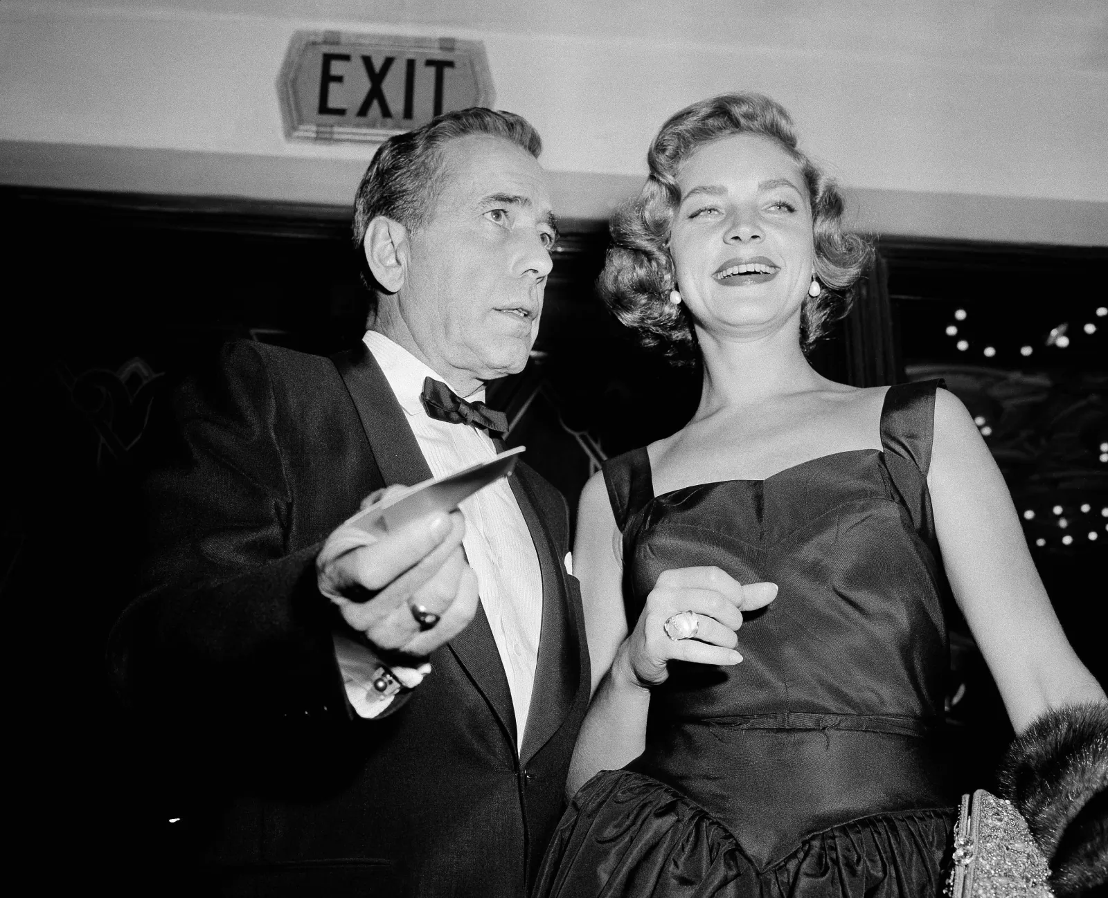 Humphrey Bogart arrives with his wife Lauren Bacall for the Hollywood premiere of the picture in Los Angeles, Calif., Oct. 12, 1955.