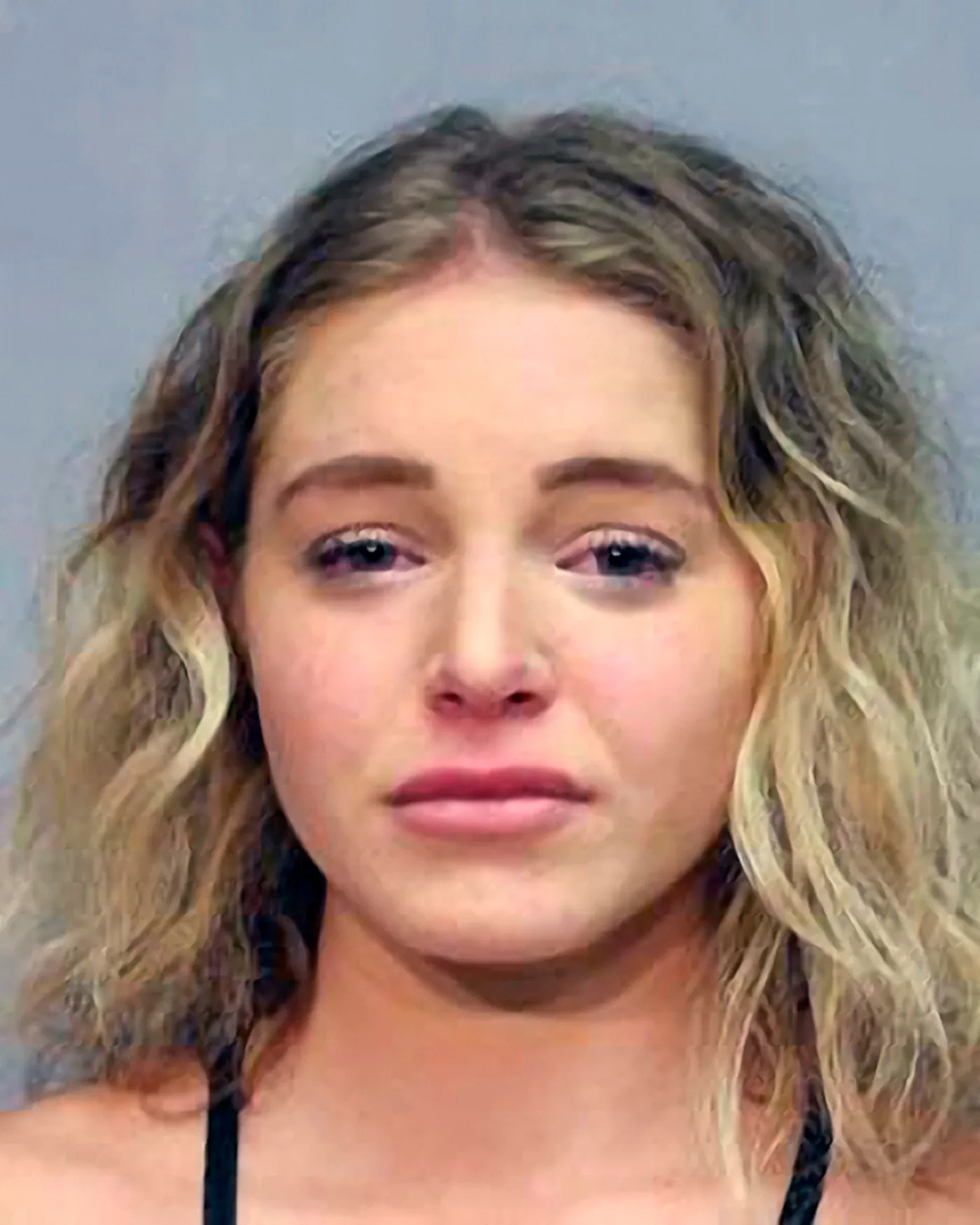 This photo provided by the Hawaii Police Department shows Courtney Clenney. Law enforcement in Hawaii on Wednesday. Aug. 10, 2022 arrested social media model Courtney Clenney on a charge of second-degree murder with a deadly weapon. (Hawaii Police Department via AP)