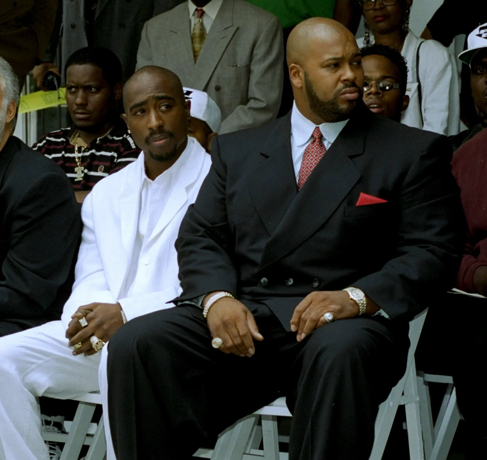 Rapper Tupac Shakur (L) and Death Row Records Chair Marion "Suge" Knight attend an event in Los Angeles on August 15, 1996.