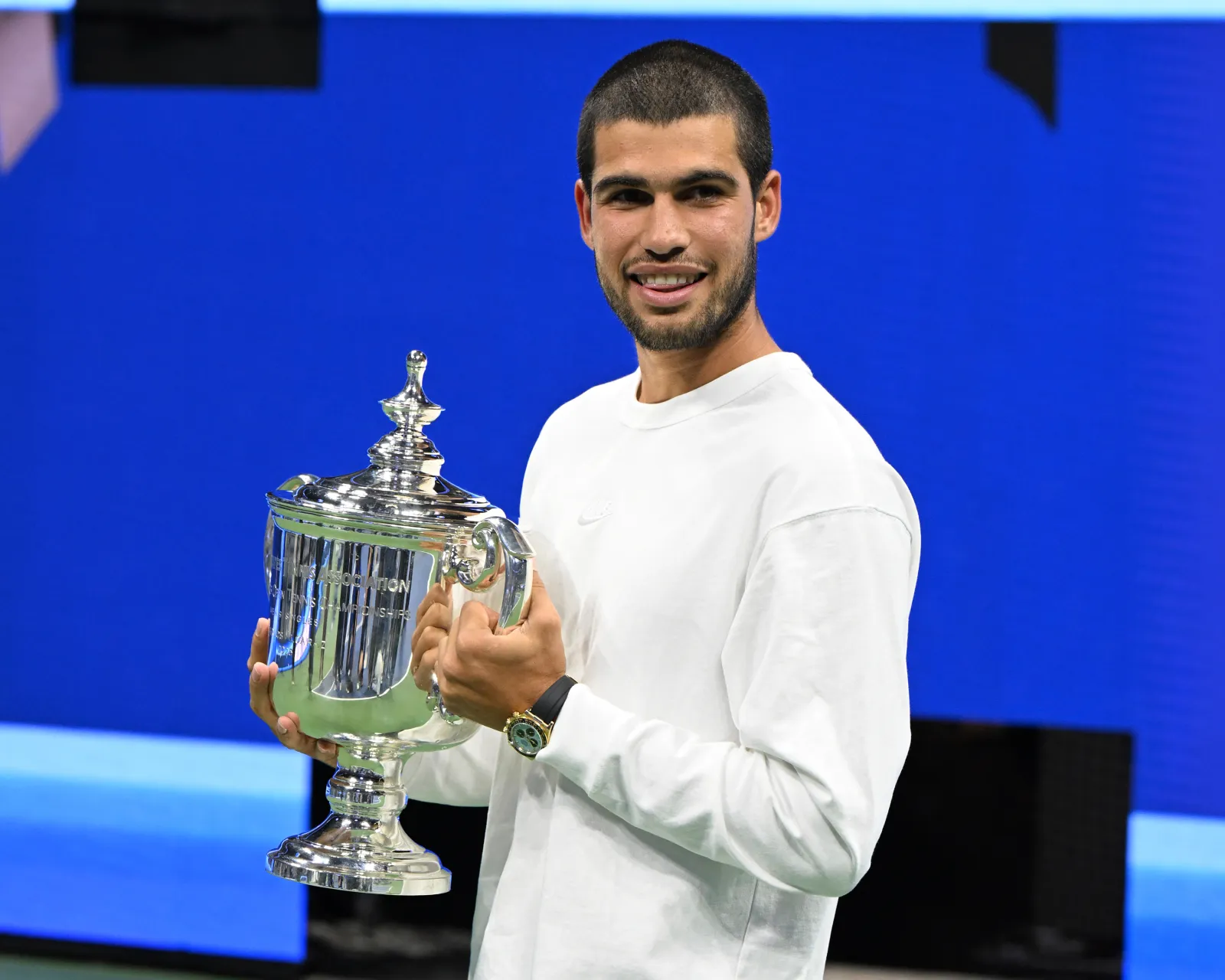 Carlos Alcaraz holds the championship trophy after winning the men's final of the U.S. Open in Arthur Ashe Stadium at the USTA Billie Jean King National Tennis Center on September 7, 2025, in Flushing Meadows-Corona Park in the Queens borough of New York City. (mpi04/MediaPunch/IPX)