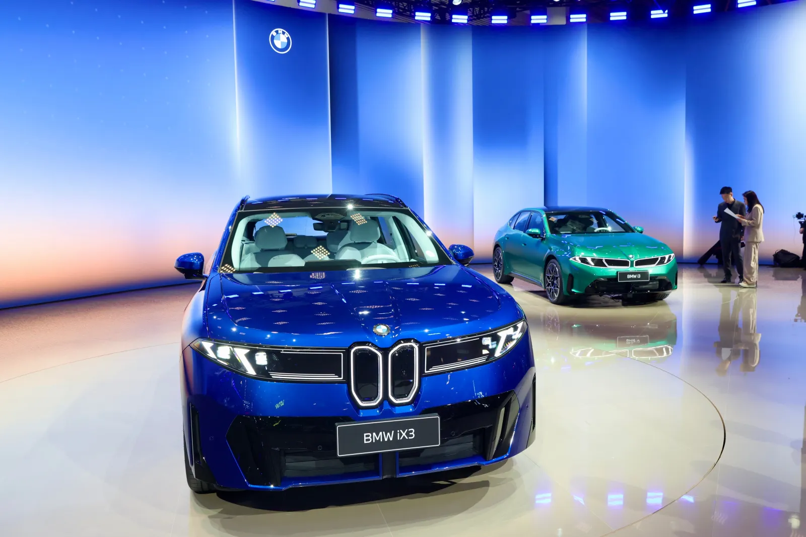 BMW iX3 and BMW i3 on display during the 2026 Beijing International Automotive Exhibition on April 24, 2026.