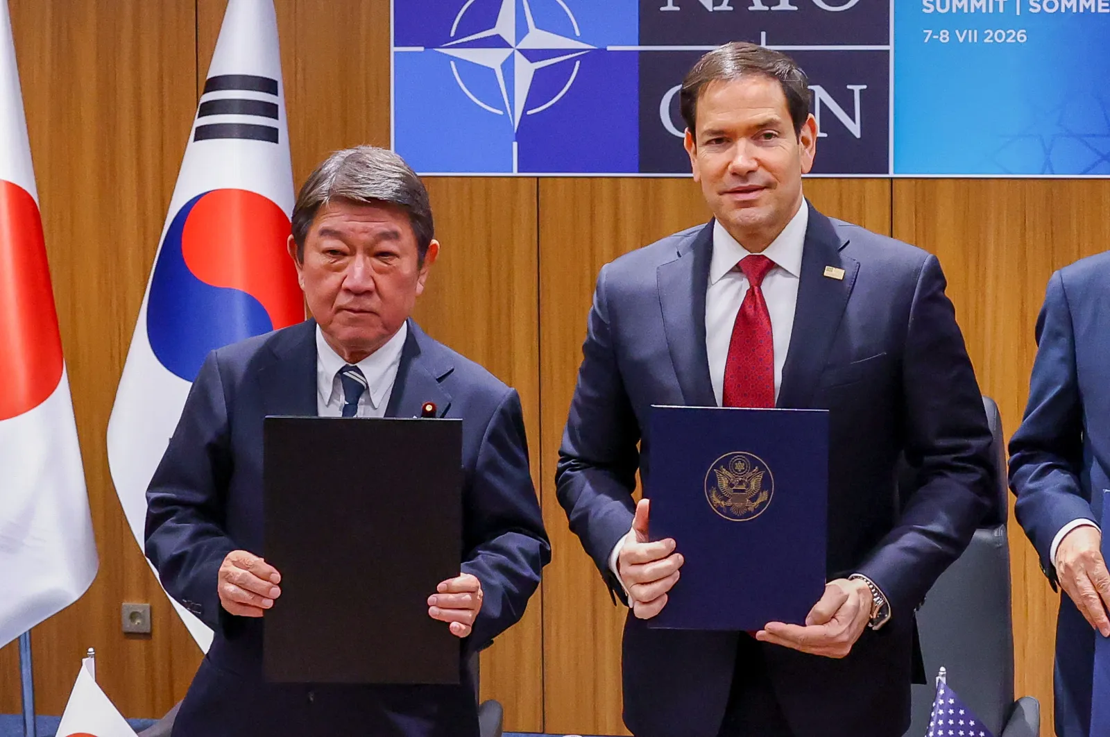 Secretary of State Marco Rubio poses for a photo with Japanese Foreign Minister Motegi Toshimitsu, July 7, 2026.