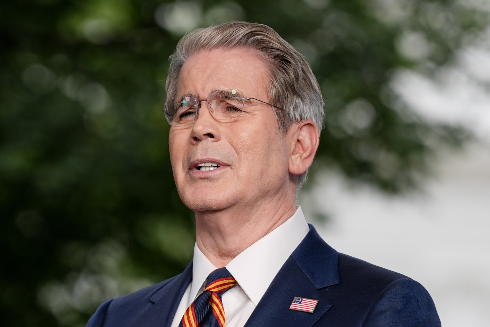 Treasury Secretary Scott Bessent speaks during an interview outside the White House, Thursday, July 30, 2026, in Washington.