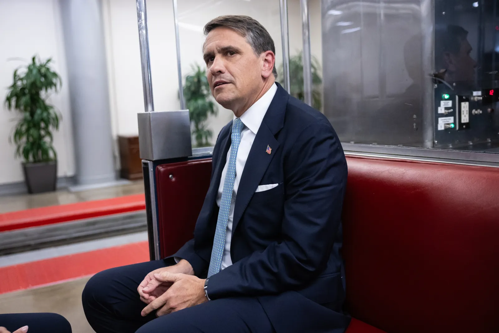 Acting Attorney General Todd Blanche looks at journalists as he sits in the Senate subway at the U.S. Capitol on August 5. (Francis Chung/POLITICO via AP Images)