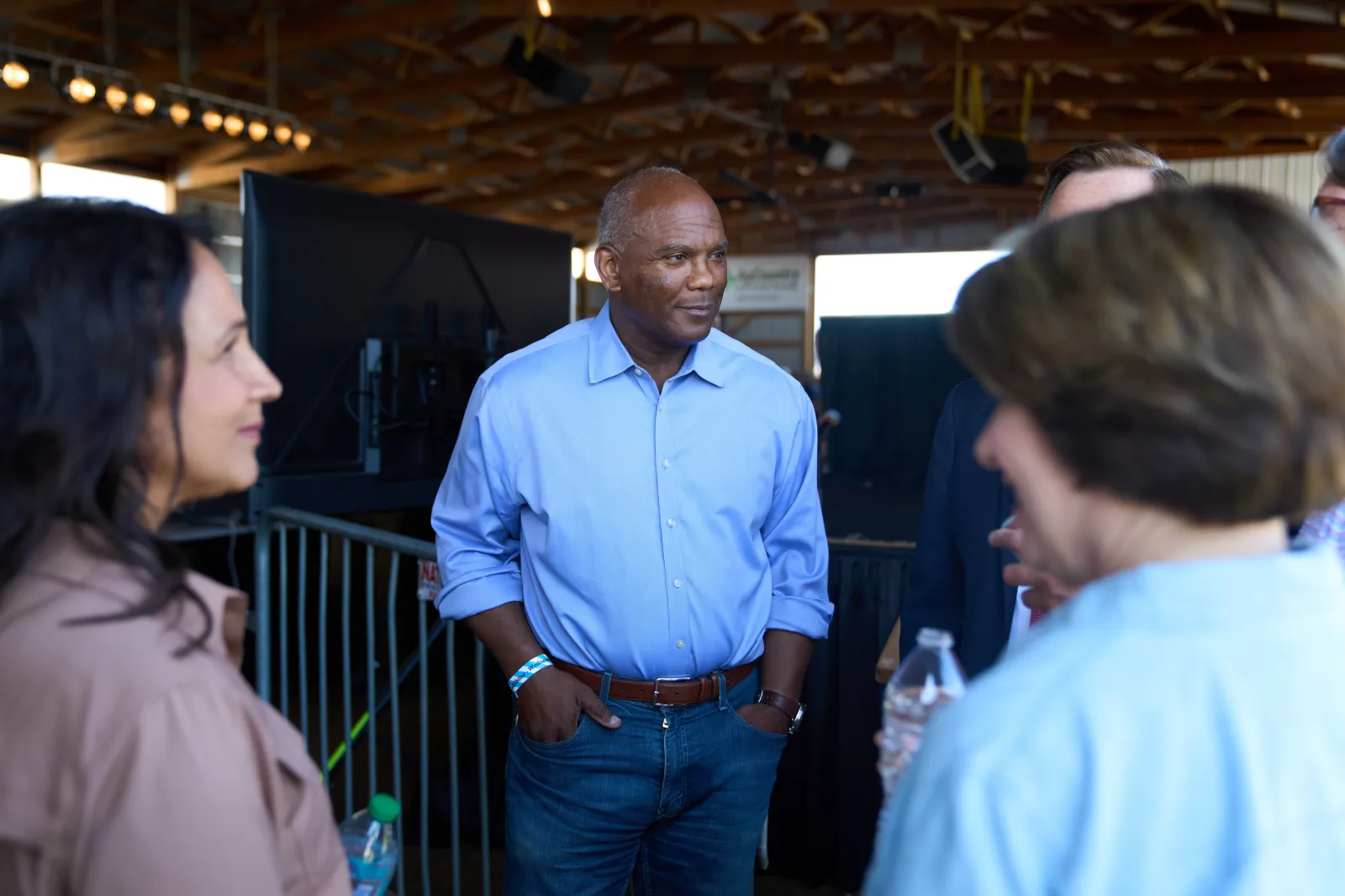 Kendall Qualls, a Republican candidate for Minnesota governor, speaks with his fellow candidates before a forum at Farmfest, Wednesday, Aug. 5, 2026, in Morgan, Minn. (AP Photo/Ellen Schmidt)