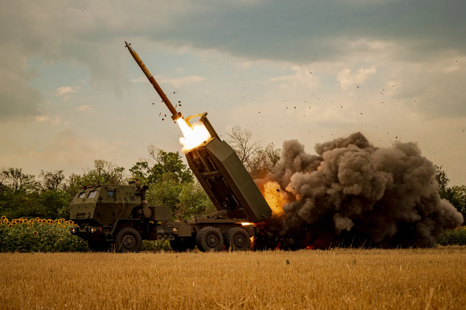 A Ukrainian HIMARS crew, attached to the 148th brigade, fires rockets at Russian positions, on the front line in eastern Ukraine, on August 8, 2026.