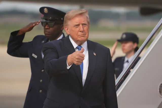 President Donald Trump gives a thumbs-up after arriving on Air Force One, Friday, Aug. 28, 2026, at Joint Base Andrews, Maryland.