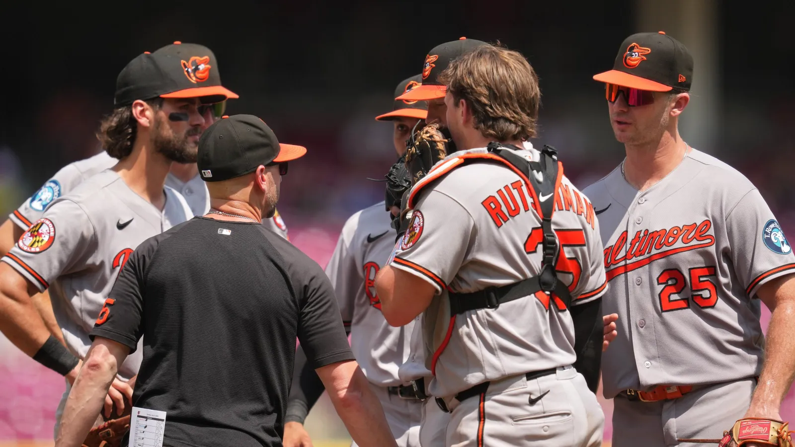  Adley Rutschman #35 of the Baltimore Orioles and his teammates huddle at the pitcher's mound during the eighth inning of the baseball game against the Cincinnati Reds at Great American Ball Park on July 05, 2026 in Cincinnati, Ohio. (Photo by Jeff Dean/Getty Images)