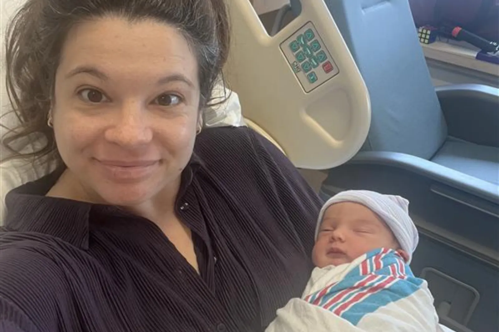 A photo shows Jenni Fink and her son Theo in the hospital.