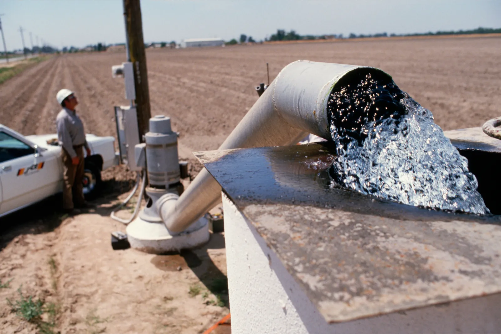 File image: An employee checks an electric meter at an agricultural pumping station in the San Joaquin Valley in California.
