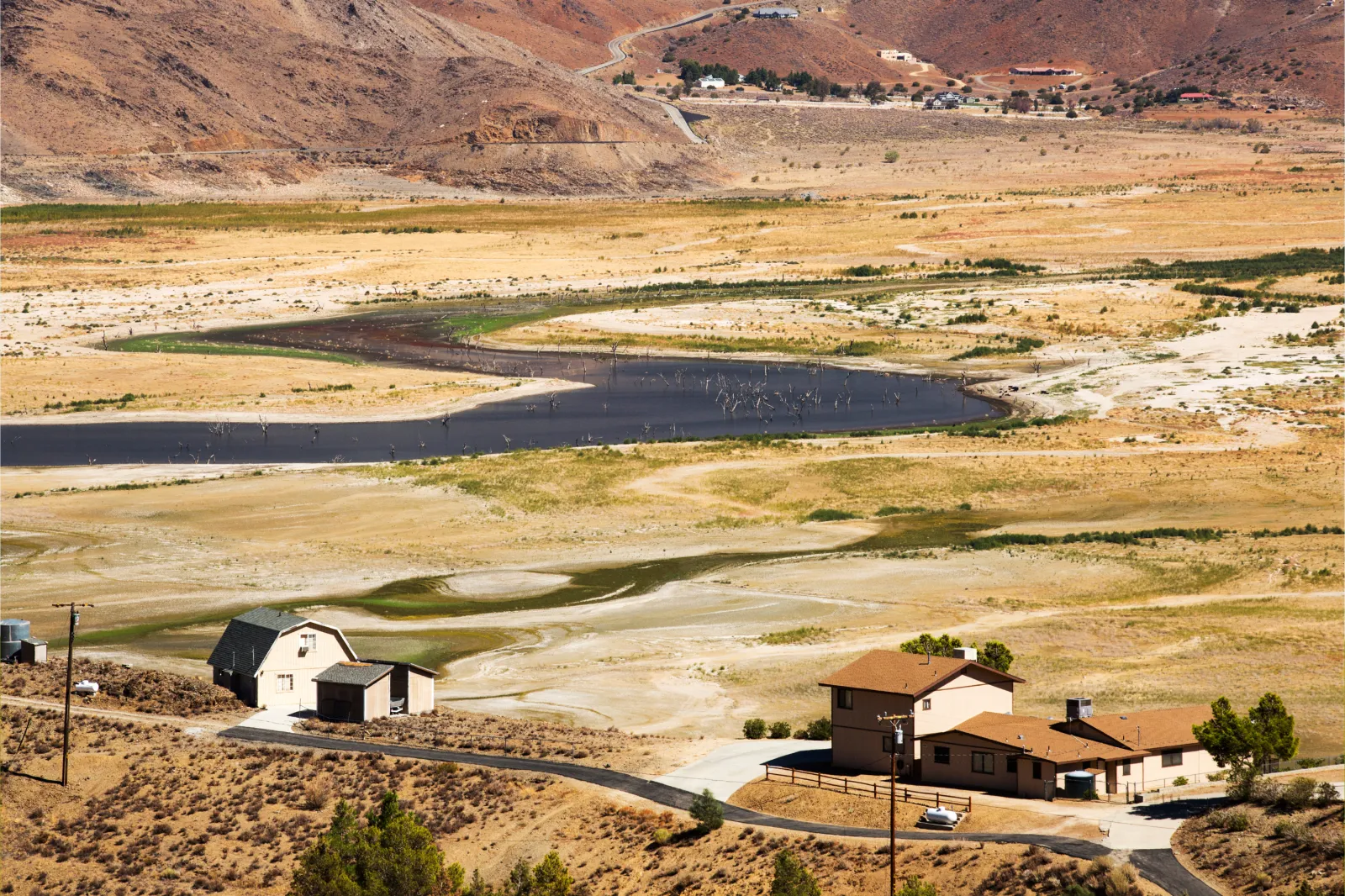 Lake Isabella near Bakersfield, East of California's Central valley is at less than 13% capacity following the four-year-long devastating drought. The reservoir has dropped so low, that the water level is below the outflow pipe.